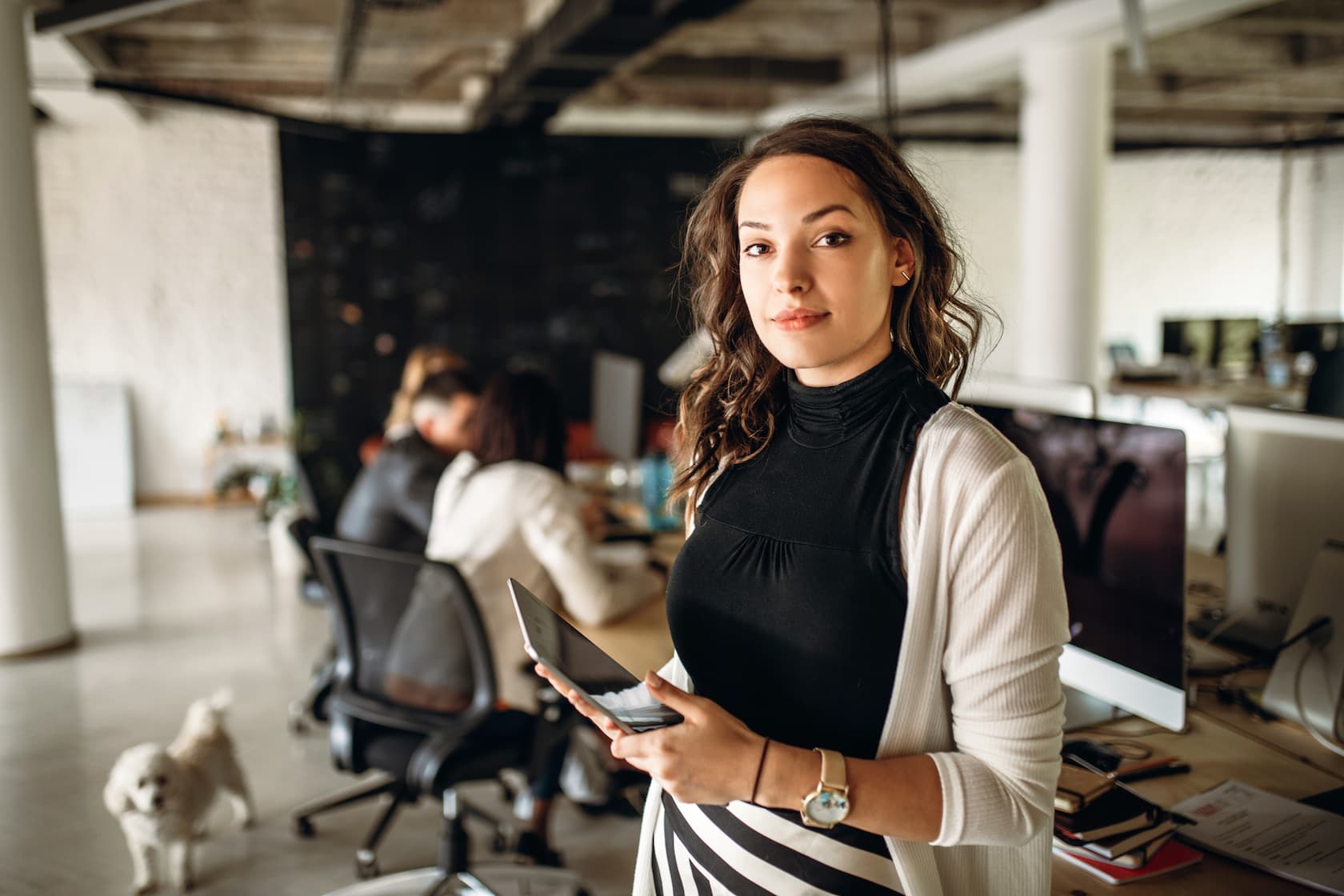 Confident business woman looking into the camera